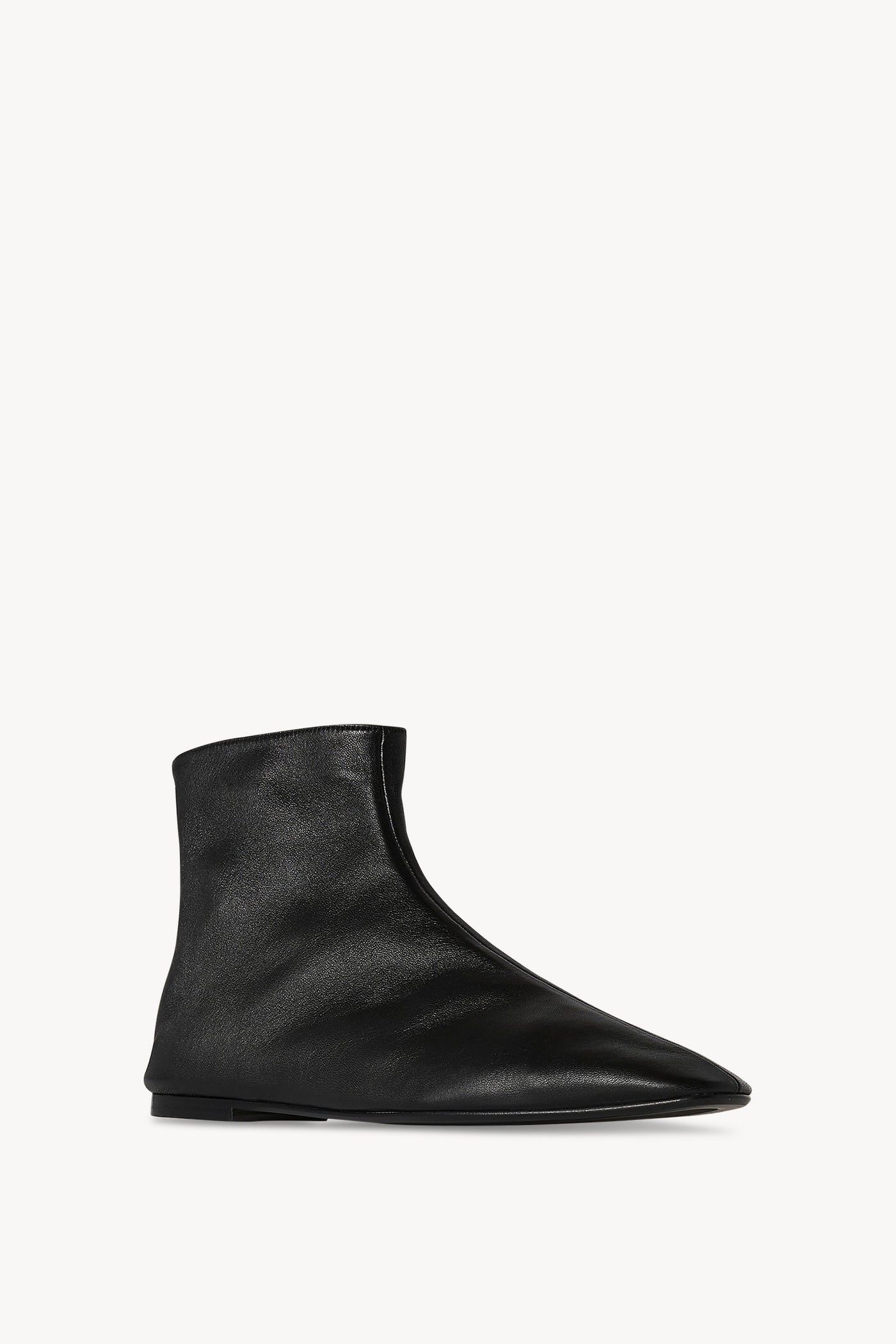 Ava Leather Ankle Boots in Black - The Row